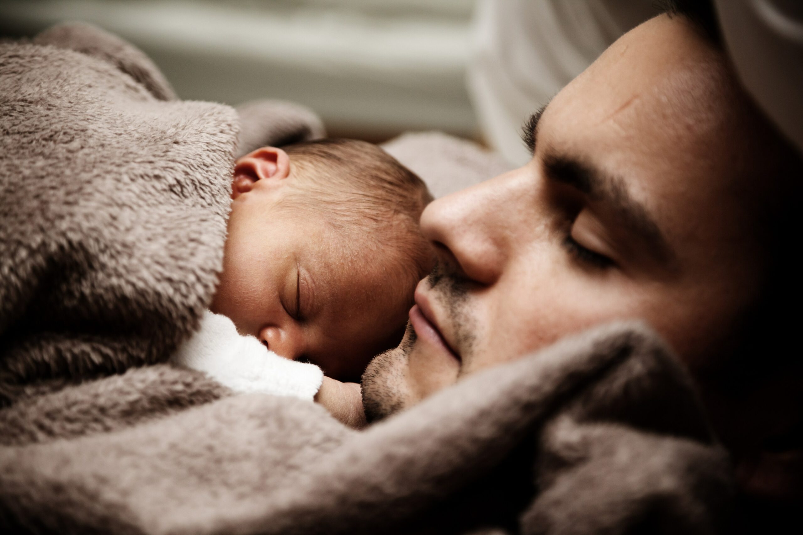 newborn baby with his father